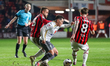 Liam Kelly of Milton Keynes Dons challenges for the ball as he defends during the Sky Bet...