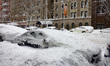 Cars are buried as blizzard conditions persist for a second day in New York City, United S...
