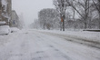 Snow accumulates on streets amidst blizzard conditions in New York City, United States, on...