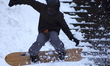 Young New Yorkers in Central Park, Manhattan, jump in the snow in New York City, USA, on F...