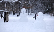 A New York family is in Central Park, Manhattan, on February 23, after the snowstorm passe...
