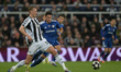 Dan Burn of Newcastle United is in action during the UEFA Champions League Knockout Play-o...