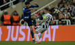 Kieran Trippier of Newcastle United and Abdellah Zoubir of Qarabag battle for the ball dur...