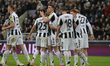 Sven Botman of Newcastle United celebrates with his teammates after heading their third go...