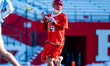 Ryan Parker (14) of the Rutgers Scarlet Knights possesses the ball during an NCAA men's la...