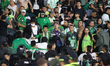 Police officers speak with Atletico Nacional fans during the match between Independiente S...