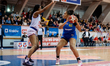 Constance Hobby and Taylor Williams play during the basketball game between Wisla Krakow a...