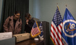 Two young Iranian women visit the former U.S. Embassy in Tehran, Iran, on February 26, 202...