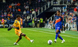Kenji Mboma Dem passes to a teammate during the 2026 CONCACAF Champions Cup between FC Cin...