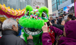 A traditional lion dance performance takes place as part of the traditional kick start of...