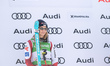 Nina Ortlieb of Austria stands at the podium ceremony during the Audi FIS World Cup downhi...