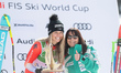 Corinne Suter of Switzerland and the Minister of Sports, Ms. Monica Bonell, pose for the p...