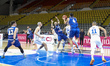 Ioannis Pashialis of Cyprus takes a rebound in front of Yam Madar of Israel and Yotam Hano...