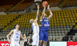 Ioannis Pashialis of Cyprus scores in front of Guy Palatin of Israel. Israel plays against...