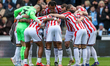 The Stoke City team huddles at kick-off during the Sky Bet Championship match between Cove...