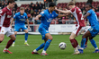 Jack Perkins of Northampton Town challenges Brandon Khela of Peterborough United during th...