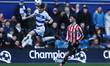 Ronnie Edwards of Queens Park Rangers heads the ball during the Sky Bet Championship match...
