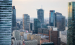 A westward skyline view shows Warsaw UNIT, Generation Park, Warsaw Spire, the Studio compl...