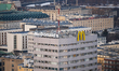 A close-up view shows the McDonald's sign on the high-rise building at Swietokrzyska 35 in...