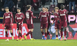 Players of CFR celebrate during the Romania Superliga match between CFR Cluj and Petrolul...