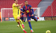 Santi Comesana and Raphinha Dias play during the match between FC Barcelona and Villarreal...