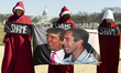 Demonstrators dressed as handmaids from The Handmaid's Tale hold a Trump-Epstein sign duri...