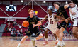 Ryan Curry of the Army Black Knights drives the ball during an NCAA men's basketball game...