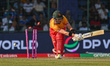 Brad Evans of Zimbabwe gets bowled during the Super Eights match of the 2026 ICC Men's T20...