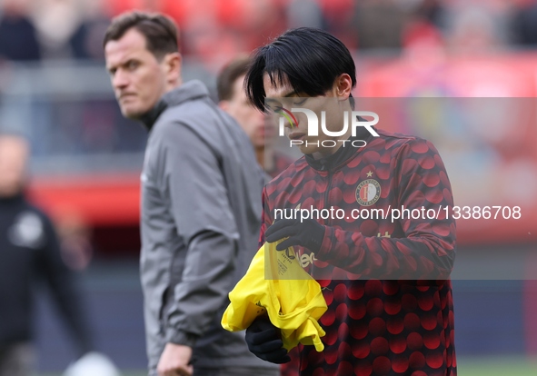 Feyenoord player Ayase Ueda warms up during the Dutch Eredivisie match between FC Twente and Feyenoord at Grolsch Veste in Enschede, Netherl... by EYE4images/NurPhoto