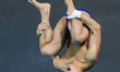 Bai Yuming of China competes in the Men's 10m Platform Final during the World Aquatics Div...