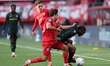 FC Twente player Daan Rots, FC Twente player Bart van Rooij, and Feyenoord player Raheem S...