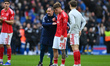 Luca Netz of Nottingham Forest and Vitor Pereira, Nottingham Forest head coach, look dejec...