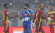 Team West Indies congratulates Sanju Samson of India after being defeated by India during...
