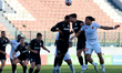 Yannick Yankam of Valletta vies for the ball with Cain Attard of Hibernians during the YoH...