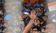 Fans of India react during the T20 World Cup cricket match between India and West Indies i...