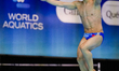 Zheng Jiuyuan of China competes in the Men's 3m Springboard Final during the World Aquatic...
