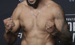 Ryan Gandra of Brazil poses on the scale during the UFC Fight Night ceremonial weigh-in at...