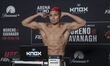 David Martinez of Mexico poses on the scale during the UFC Fight Night ceremonial weigh-in...