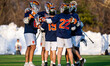 The Syracuse Orange huddle during an NCAA men's lacrosse game at 1952 Stadium in Princeton...