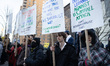 Demonstrators march to Trump Tower in New York City, USA, on March 2, 2026, denouncing the...