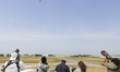 Photographer and plane spotters take pictures of the aerobatics of the Dassault Rafale B o...