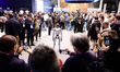 Congress attendees watch the Honor humanoid robot by Honor, the technology brand known for...