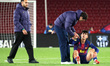 Andreas Christensen consoles Marc Bernal at the end of the match between FC Barcelona and...