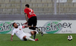 Shaisen Attard of Hamrun Spartans is confronted by Steve Borg of Valletta during the Merid...