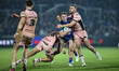Jake Truman is tackled during the BetFred Super League match between Wakefield Trinity and...