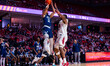 TRAE BROADNAX (12) of the Rice Owls attempts a two-point field goal over DERRIAN FORD (22)...