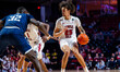 Aiden Tobiason, 25, of the Temple Owls possesses the ball during an NCAA men's basketball...