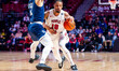 MASIAH GILYARD (10) of the Temple Owls drives the ball on TRAE BROADNAX (12) of the Rice O...