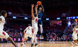 Jalen Smith (2) of the Rice Owls attempts a two-point field goal over Masiah Gilyard (10)...