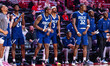 The Rice Owls bench reacts during an NCAA men's basketball game at The Liacouras Center in...